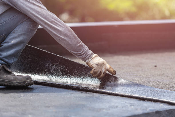 Professional Emergency Waterproofing technician working in Wales Center, NY